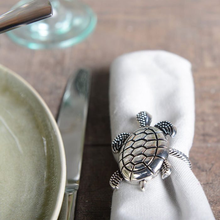 Lot of 4 rounds of silver turtle towels
