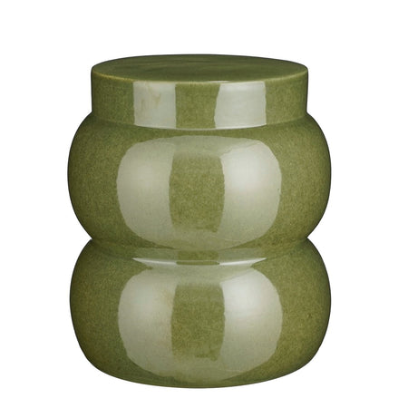 Green ceramic side table on a white background