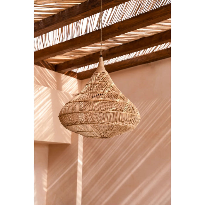 Woven pendant light hanging from a wooden ceiling
