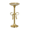 Gold side table with decorative bow design on a white background