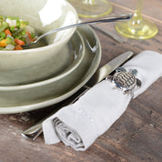 Lot of 4 rounds of silver turtle towels